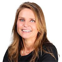 Klara Prachar, co-founder of Wellness Works Consultants, specializing in mental health consulting, OCD treatment, and community mental health in Virginia.